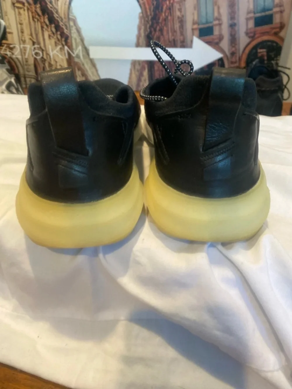 Cole Haan Men's Black Slip-On Athletic Sneakers with Yellow Heel